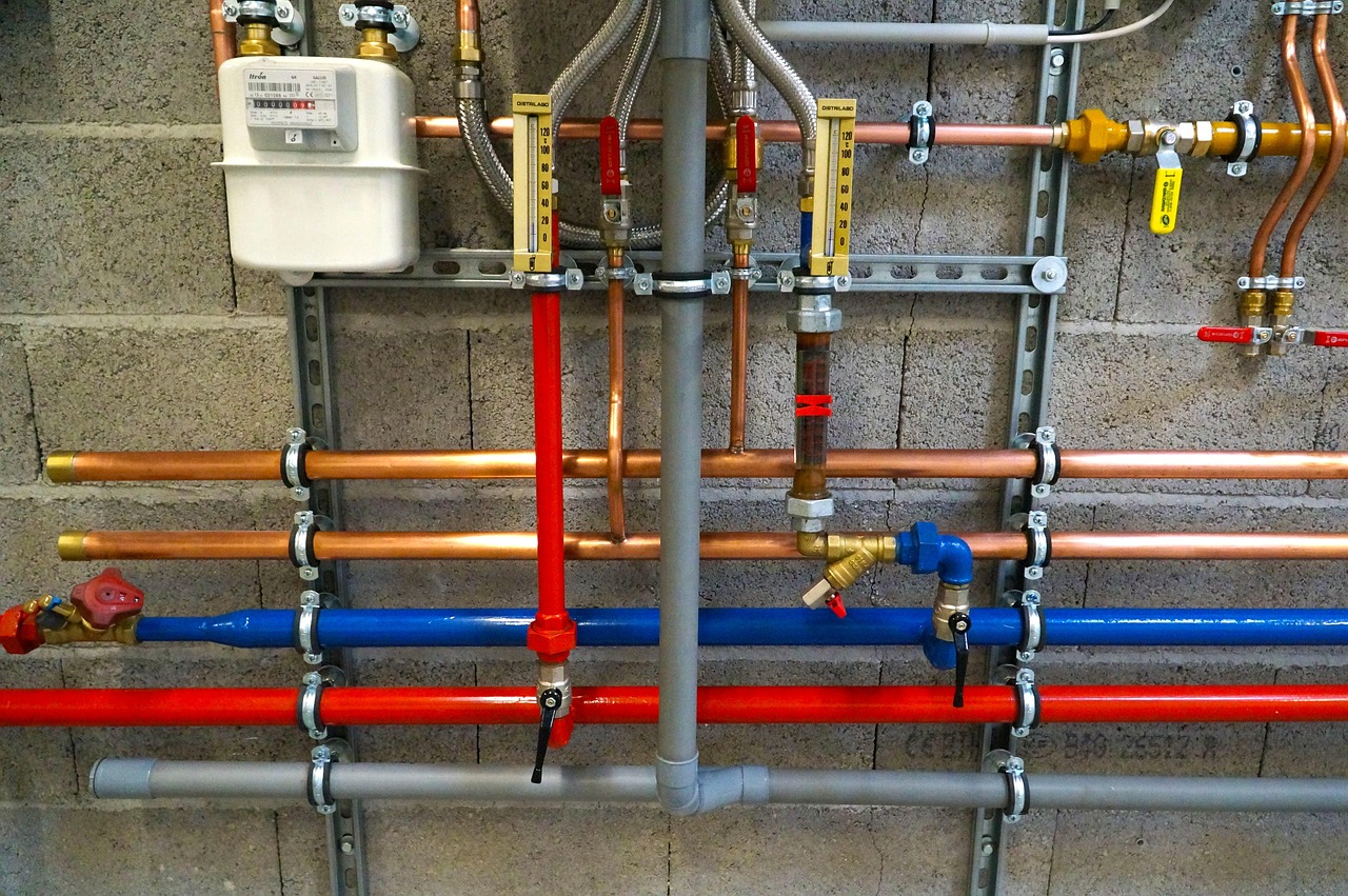 Contractor repairing pipes